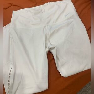 White Nike leggings with cut out leg. Size Large